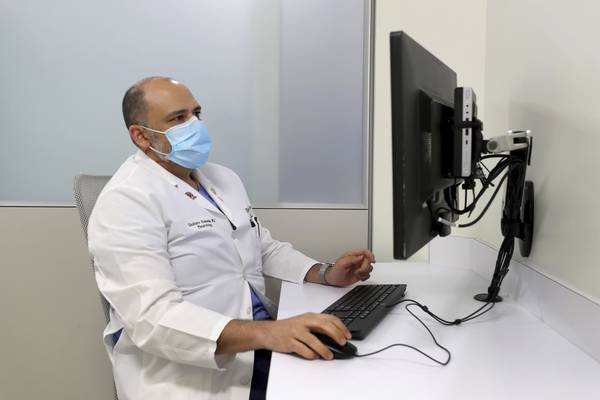 doctor on computer
